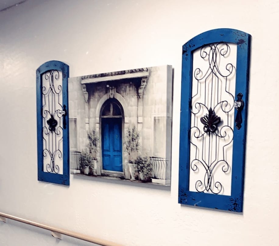 artwork of wireframed doors on walls