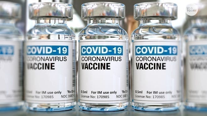 5 covid-19 vaccine bottles