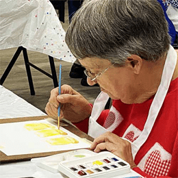 Discover the therapeutic benefits of artistic expression with resident painting in our specialized memory care program at Glencroft.