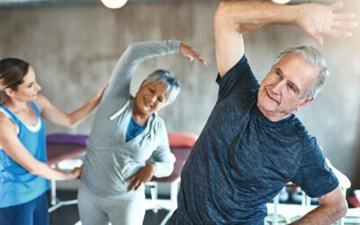 seniors stretching with instructor