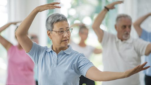 woman enjoying one of the many hobbies for seniors, tai chi